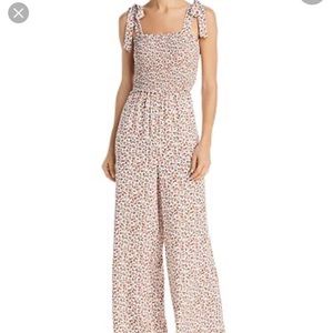 Sadie & Sage Ditzy Smocked Floral Jumpsuit